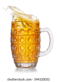 Lager Beer In Mug With Splash Isolated On White Background. Pub Alcohol Drink