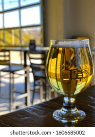 Lager Beer On A Bar In A Local Brewery Tap Room.