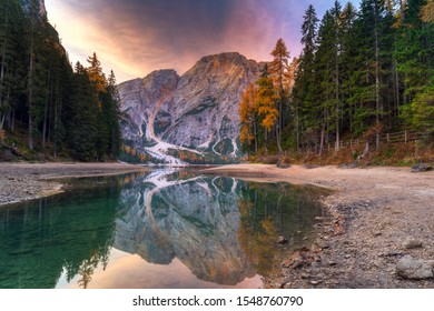 Lago di Braies lake and Seekofel peak at sunrise, Dolomites. Italy - Shutterstock ID 1548760790