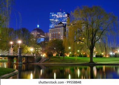 Lagoon Bridge and skyline of Boston, Massachusetts from the Boston Public Gardens.