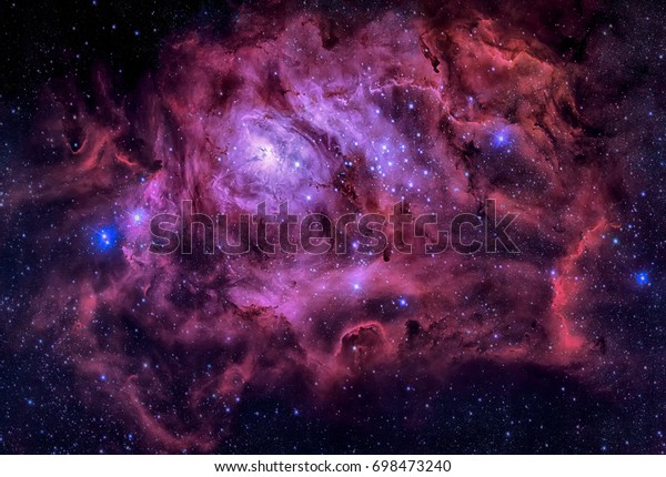 Lagoon Nebula. This giant cloud of gas and dust is\
creating intensely bright young stars, and is home to young stellar\
clusters. Retouched colored image. Elements of this image furnished\
by NASA.