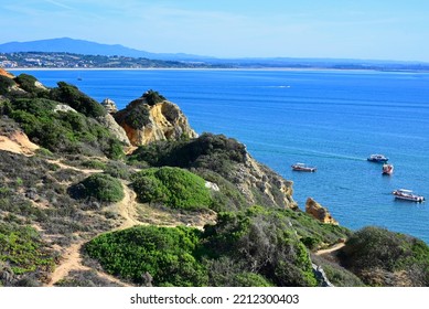 Lagos, Algarve, Faro, Portugal, Europe - 09.23.2022 : Walking Trails On High Cliff Between Dona Ana Beach And Ponta Da Piedade, Atlantic Ocean, In Far Background Right - Meia Praia