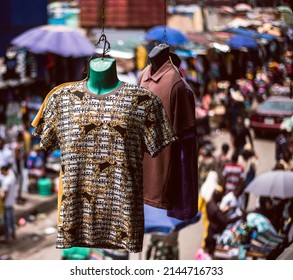 Lagos Island, Lagos NIGERIA - April 8, 2022: Shirts Hanged Outside A Clothing Store Displayed For Sale On The Road Side