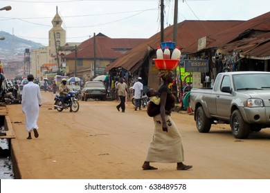 LAGOS, NIGERIA - AUGUST 13, 2012: Street View With People And Cars In The City Of Lagos, The Largest City In Nigeria And The African Continent. 