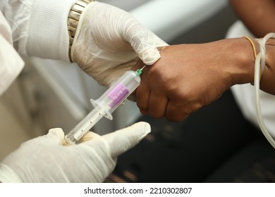 Lagos Nigeria West Africa-October 5 2022: Process Of Injecting In The Hospital For Blood Samples With Needle And Syringe