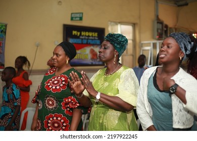 Lagos Nigeria-September 4, 2022:  Women Dancing With Teenager During Church Service