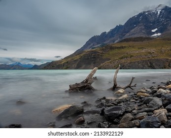Laguna Amarga (Bitter Lagoon) with breathtaking views of the distinctive three granite peaks of the Paine mountain range. Torres del Paine National Park, southern Patagonia, Magallanes, Chile - Shutterstock ID 2133922129