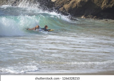 Laguna Beach, CA / USA - 12/24/2018 : Christmas Eve Boogie Boarding In Southern California