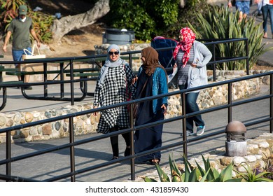 Laguna Beach, CA/USA: 5-30-2016: Middle Eastern Women Walking In The Laguna Beach Area.  According To Pew Research Center, There Are 3.3 Million Muslims Of All Ages In The U.S. As Of 2015.