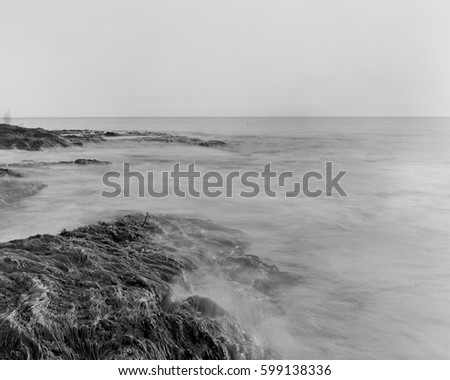 Similar – Image, Stock Photo Beach with rocks and puddle in a sunset, ribadeo, lugo, galician, spain