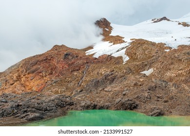Laguna Verde or green lagoon at 4700m altitude along the hike to the peak of the Cayambe volcano, Cayambe Coca national park, Ecuador.