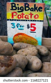 LAHAINA, HI -31 MAR 2018- Colorful  Fruit And Vegetable Labels At A Road Stand Produce Market In Maui, Hawaii.