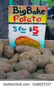 LAHAINA, HI -31 MAR 2018- Colorful  Fruit And Vegetable Labels At A Road Stand Produce Market In Maui, Hawaii.