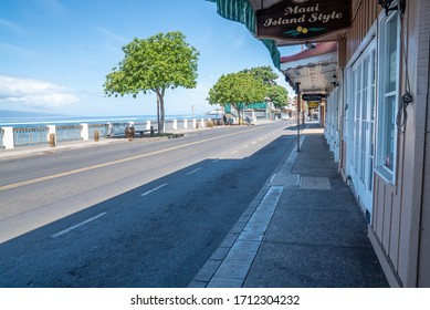 LAHAINA, MAUI, HAWAII / USA - APRIL 22, 2020:  Popular historic travel and tourism destination, Front Street in Lahaina, Hawaii, is closed for business during the Covid-19 coronavirus pandemic.  