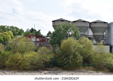 Lahnstein, Germany - 07 25 2022: Modern Paper Mill Buildings Next To And Old Red Brick Building