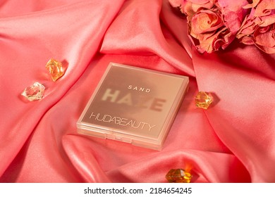 Lahore, Pakistan - 02 22 2022: Beauty product photography on silk fabric with art direction