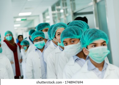 Lahore, Pakistan - 4 June, 2020: Selective Focus ,Asian Kids Walking With Surgical Mask Face Protection Walking In Hospital For Corona Virus Test.