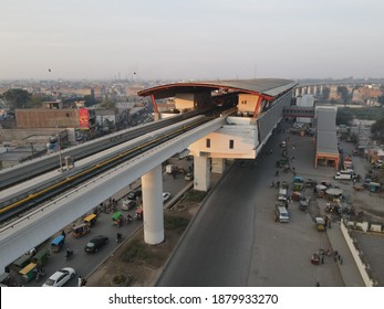 Lahore, Pakistan - December 20, 2020: An Elevated Station Of Orange Line Metro Train Of An Urban Area.