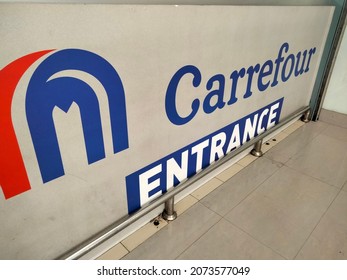 Lahore, Pakistan - November 12 2021: Carrefour Supermarket Entrance Sign Displayed On Lower Side Of A Entrance Gate