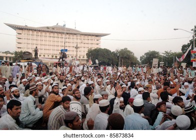 LAHORE, PAKISTAN -OCT 01: Supporters Of Sunni Tehreek (ST) Are Protesting In Favor Of Mumtaz Qadri During Rally At Mall Road On October 01, 2011in Lahore .