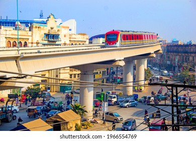 Lahore Punjab, Pakistan. February 01, 2021, Orange Line Metro Train Going Near Lakshmi Chowk Lahore. 