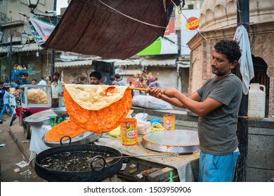 Lahore/Pakistan-August 14, 2019: Man Is Cooking Street Food At The Streets Of Lahore, Pakistan