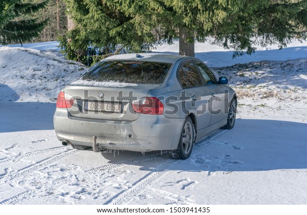 Lahti, Finland, Circa March 2019: bmw car\
stands on parking lot in winter on snowy\
road
