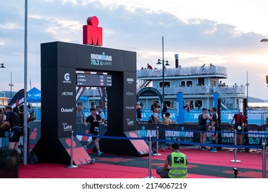 Lahti Finland - July 2, 2022. Semi-iron Triathlon IRONMAN 70.3 FINLAND 2022! The Athlete Is Approaching The Finish Line.