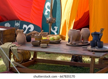 Laid table inside an ancient gallic tent in an encampment at a historical reenactment