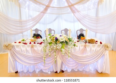 a laid wedding banquet table at a restaurant