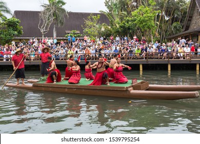 Laie, Oahu, Hawaii - April 26th, 2018 Polynesian Dancers Performer Traditional Dance Of Tonga On A Canoe Float At The Popular Tourist Attraction On Oahu, Hawaii - Polynesian Culture Center