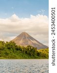 Lake Arenal and Volcano Arenal, in Arenal National Park, Alajuela Province, San Carlos, Costa Rica, Central America