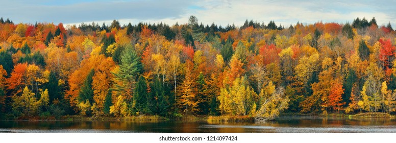 Lake With Autumn Foliage And Mountains In New England Stowe