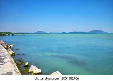 Lake Balaton Beach With Badacsony Mountain In The Background 