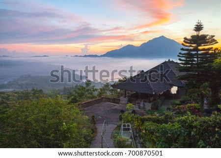 Lake Batur near Kintamani volcano in the morning, viewed from Penelokan are a popular sightseeing destination in Bali's central highlands, Indonesia. 