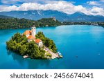 Lake Bled in Slovenia. Beautiful mountains and Bled lake with small Pilgrimage Church. Bled lake and island with Pilgrimage Church of the Assumption of Maria. Bled, Slovenia, Europe.