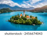 Lake Bled in Slovenia. Beautiful mountains and Bled lake with small Pilgrimage Church. Bled lake and island with Pilgrimage Church of the Assumption of Maria. Bled, Slovenia, Europe.