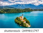 Lake Bled in Slovenia. Beautiful mountains and Bled lake with small Pilgrimage Church. Bled lake and island with Pilgrimage Church of the Assumption of Maria. Bled, Slovenia, Europe.