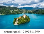 Lake Bled in Slovenia. Beautiful mountains and Bled lake with small Pilgrimage Church. Bled lake and island with Pilgrimage Church of the Assumption of Maria. Bled, Slovenia, Europe.