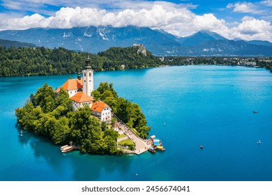 Lake Bled in Slovenia. Beautiful mountains and Bled lake with small Pilgrimage Church. Bled lake and island with Pilgrimage Church of the Assumption of Maria. Bled, Slovenia, Europe. - Powered by Shutterstock