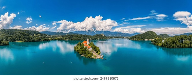 Lake Bled in Slovenia. Beautiful mountains and Bled lake with small Pilgrimage Church. Bled lake and island with Pilgrimage Church of the Assumption of Maria. Bled, Slovenia, Europe.