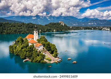 Lake Bled in Slovenia. Beautiful mountains and Bled lake with small Pilgrimage Church. Bled lake and island with Pilgrimage Church of the Assumption of Maria. Bled, Slovenia, Europe. - Powered by Shutterstock