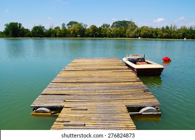 Lake  Boat Dock  With Boat And Vintage Effect