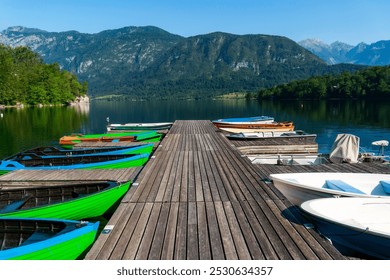 Lake Bohinj, largest permanent lake in Slovenia, Bohinj Valley of the Julian Alps, northwestern Upper Carniola region, Triglav National Park, Kayak ride activity, summer, adventure in bohinj lake - Powered by Shutterstock