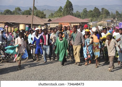 LAKE BUNYONYI, UGANDA/AFRICA - 07 19 2010: [Angry Mob Following A Woman Accused Of Adultery]