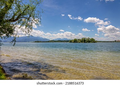The lake called Chiemsee in Bavaria, Germany at a cloudy but bright day in summer.