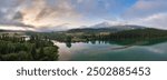 Lake in Canadian Mountain Landscape. Dramatic Sunrise Sky. Alberta, Canada.