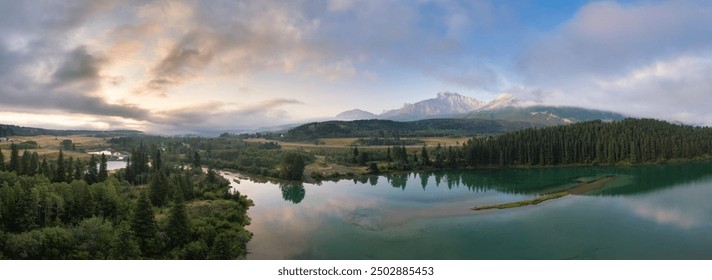 Lake in Canadian Mountain Landscape. Dramatic Sunrise Sky. Alberta, Canada. - Powered by Shutterstock