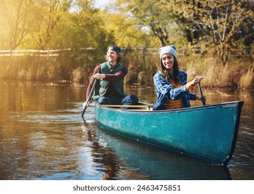 Lake, canoe and couple with nature, vacation and happiness with love, romance and bonding together. Water, river or man with woman, environment or holiday with weekend break, relationship or activity
