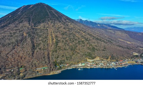Lake Chuzenji and Mount Nantai at nikko national park japan in autumn season. - Shutterstock ID 1587352777